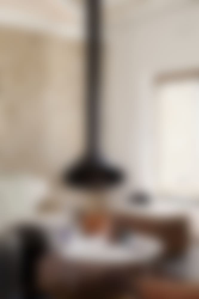 The stylish hanging fireplace for cooler nights.